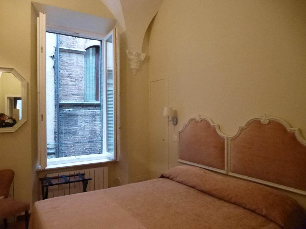 B&B Quattro Cantoni Siena Rum bild