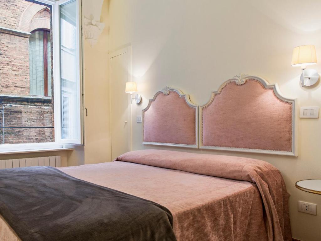 B&B Quattro Cantoni Siena Rum bild